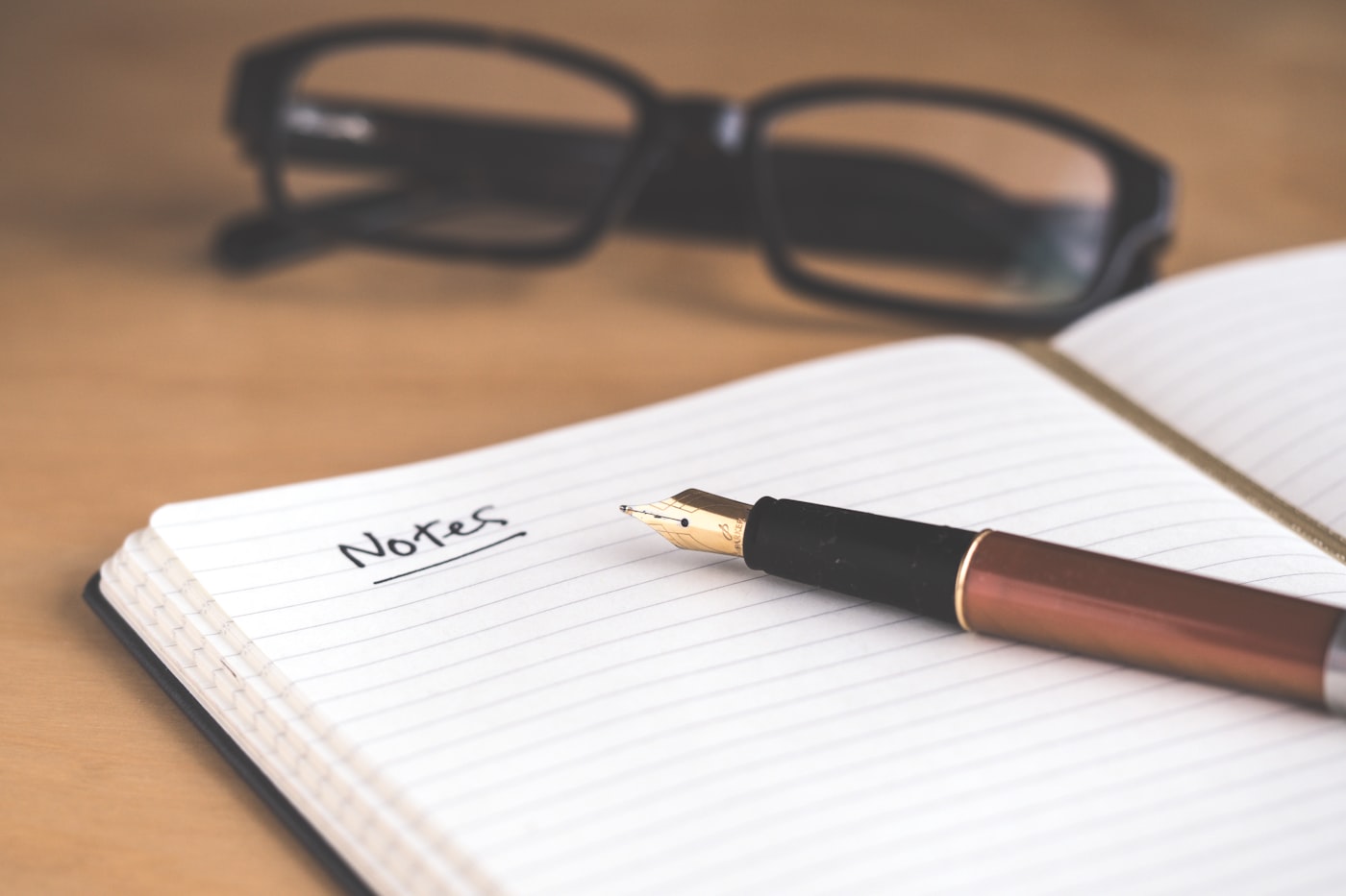 Planning creative concepts with pen and notebook